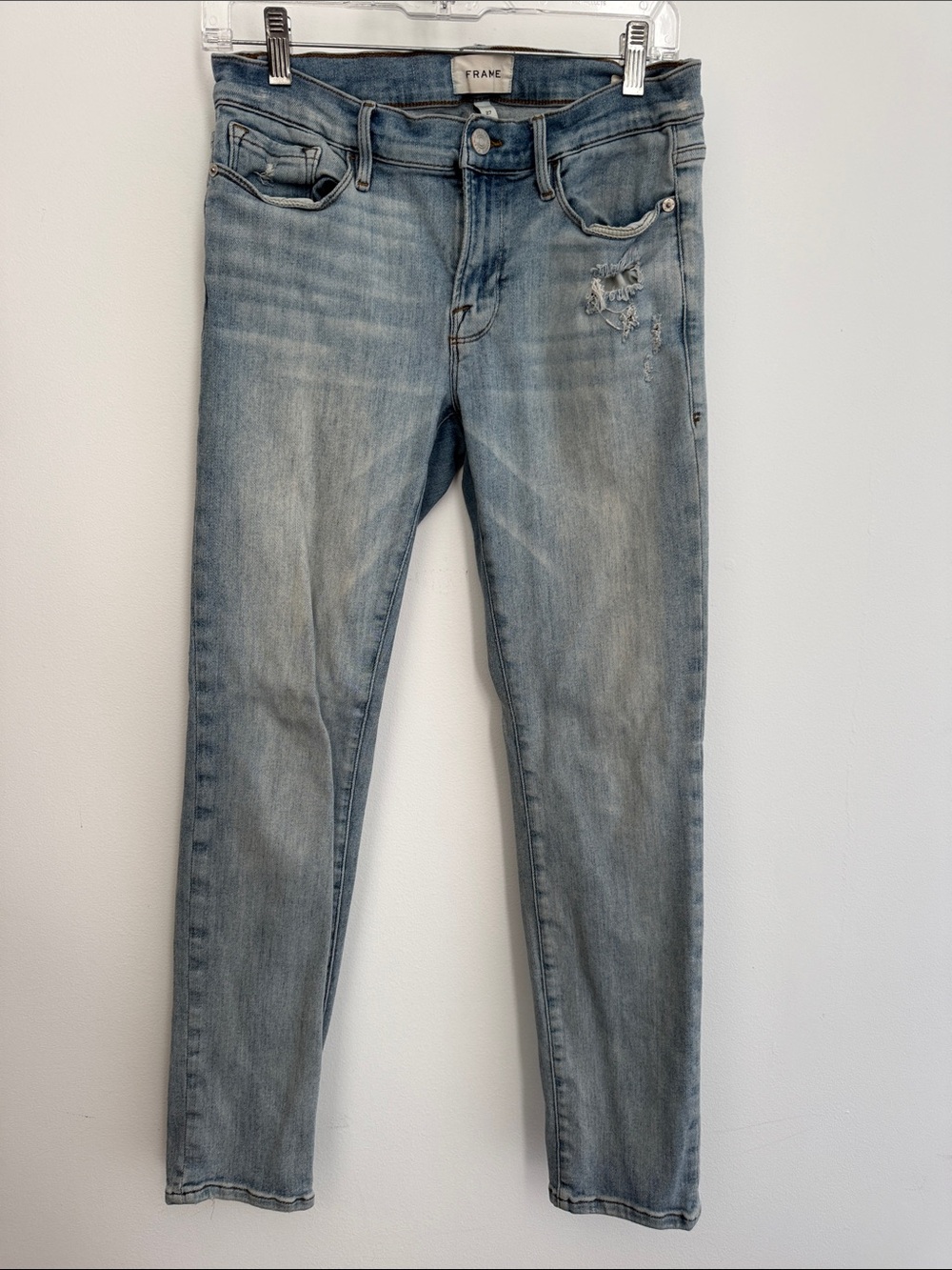 FRAME Le Garçon. Light Wash Distressed Skinny Jeans